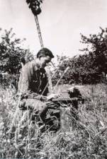 J.D. Salinger with typewriter in Normandy, France in 1944.