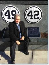 Marty Appel, who rose from a summer intern in the Yankee mailroom to its chief PR spokesman during the infamous Bronx Zoo years, relaxes at Monument Park at Yankee Stadium. Photo: Appelpr.com