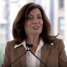 Gov. Kathy Hochul speaks at a press conference on the final federal sign-off for congestion pricing, potentially set to go into effect next spring. The Federal Highway Administration’s environmental review was concluded this week, effectively green-lighting the plan.