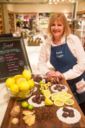 Andrea Young, Sweet Vegan founder, and her chocolate creations. Photo: Chenli Wi