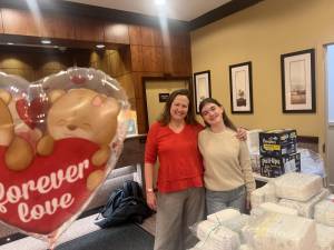 Open Hearts volunteers named Alina and Marilyn at a drive on the Upper West Side to gather supplies for babies of asylum seekers. The Open Hearts donation drive now nearing its final days on the East Side,. Photo: Courtesy Open Hearts.