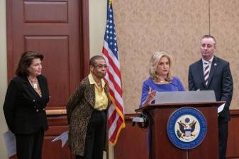 Rep. Carolyn B. Maloney (at podium) at a press conference on Monday before the passage of H.R. 1980, the Smithsonian Women’s History Museum Act, with (left to right) Jane Abraham, Chair of the Congressional Commission; Rep. Eleanor Holmes Norton; and Rep. Brian Fitzpatrick.