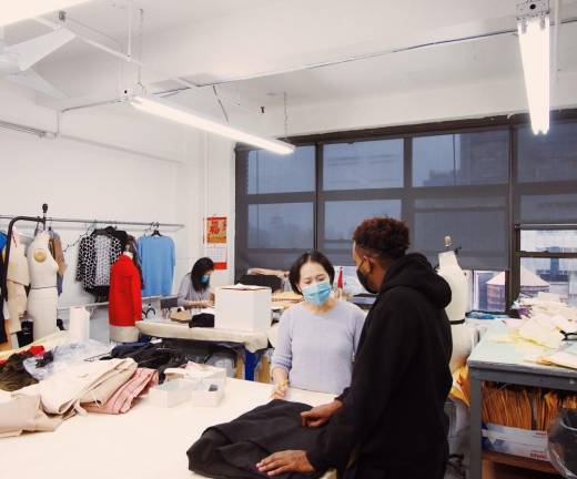 Woldegebriel has a special connection to the people who work in the garment industry because his father was a tailor. Photo courtesy of Awet Woldegebriel