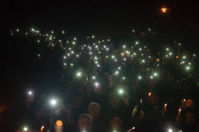 Hundreds gather at Morningside Park Sunday evening for a candlelight vigil to honor the life of Tessa Majors, who was murdered during a robbery in the park Wednesday evening.