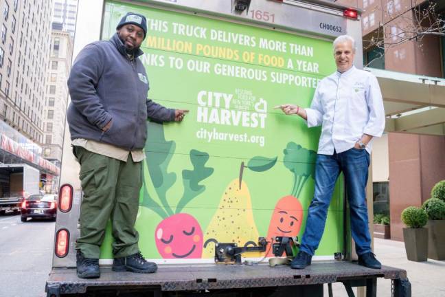 Eric Ripert (right) with City Harvest staffer and truck.
