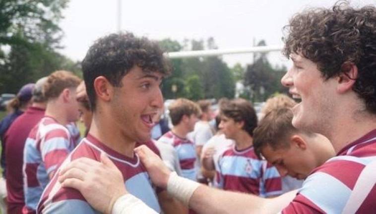 Xavier H.S. Rugby players embrace after defeating Pelham H.S. on June 11 for the NYS Championship. Three of the players have been selected to play for the U18 national training team. Photo: Xavier H.S. Instagram