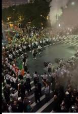 The FDNY Emerald Society Pipe and Drums near Ground Zero on 9-11, 2023 near House 10 on Liberty St, the closest to the Twin Towers on 9/11 which lost two members of ladder 10 and 3 from engine 10 and saw the firehouse itself destroyed. It was rebuilt thanks to a $1.45 million grant from FEMA to following year. Photo: FDNY