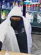 The murder suspect, clad in a white haz-mat suit, was captured on video as he prepared to shot and kill a beloved deli worker on E. 81st and Third Ave. late Friday night. Police are seeking the public’s help and ask anyone with info to call the NYPD’s Crime Stoppers Hotline at 1-800-577-TIPS (8477) or for Spanish, 1-888-57-PISTA (74782). The public can also submit tips by logging onto the CrimeStoppers website. Photo: NYPD