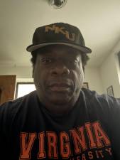 Baseball Coach Youman Wilder kept an eye on his baseball players when ICE agents came calling at Riverside Park recently.