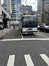 Buses traveling along the 19-block stretch of Madison Ave. below 42nd St. move 92,000 passengers a day but should be moving faster once the DOT completes the project to paint lanes dedicated solely to busess. Currently buses crawl at four to five MPH on the avenue.