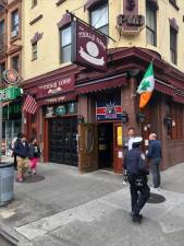 The Gardenia Italian deli and the Molly Wee Pub are among the small businesses that would be forced to move if the block south of the current Penn Station is demolished to make way for the new Hudson rail tunnel. Photo: Keith J. Kelly