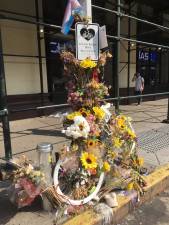 A ghost bike memorial for cyclist Robyn Hightman, 20, who was struck and killed by a truck on Sixth Ave. at 23rd St in June. Photo: David Noonan