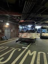 One of the NJ Transit buses damaged in the July 1 early morning crash inside the Port Authority bus terminal with damage to its, which disrupted the start of the commuter rush at the Midtown Terminal.