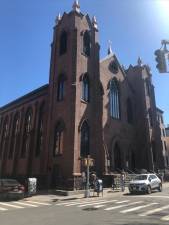 <b>St. Brigid’s Church, which opened in 1849 and nearly closed in 2007 after the Archdiocese of New York sought to sell it to a developer due to declining parishioners, is holding a Good Friday, stations of the cross procession to the Most Holy Redeemer Church, also in the East Village</b>. Photo: Keith J. Kelly