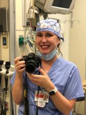 In addition to caring for COVID patients, Addie Egan has been photographing her colleagues.