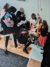 Gunman in anime backpack holds weapon on Poké people, Jan. 14. 2026.