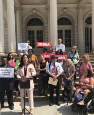 Council Member Carlina Rivera speaks at a City Hall rally in support of the Office of the Patient Advocate.