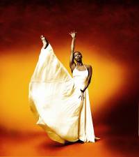 Judith Jamison, shown here in <i>Facets,</i> a solo created for her by choreographer John Butler. The dance legend started with the Alvin Ailey American Dance Theater after Ailey himself spied her at the World’s Fair in 1964, when she was 21. After Alvin Ailey passed, she became the world-renowned dance troupe’s artistic director for 21 years.
