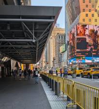 The canopy of Port Authority Bus Terminal looking north up Eighth Avenue.
