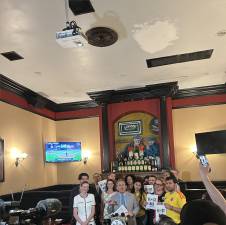 Assembly Member Tony Simone speaking on the HOST act at The Gossip Bar.