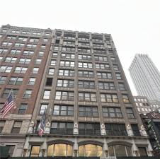 A team of developers plans on conducting an office-to-residential conversion of 29 W. 35th St. (pictured above), which will reportedly yield 107 studio apartment units, 27 of which will be deemed affordable.