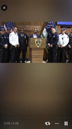 NYPD Commissioner Keechant Sewell (at mic) and Chief of Department Jeffrey Maddrey (to left of Sewell) praise the actions of the elite ESU rescue team that rappelled down the side of a building and forced a suicidal man off the ledge of a 31st story window. Photo: NYPD twitter