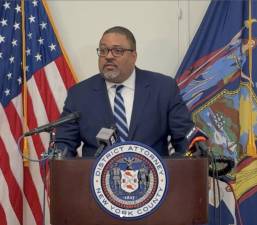 DA Alvin Bragg at a press conference the day after announcing sex-trafficking indictments.