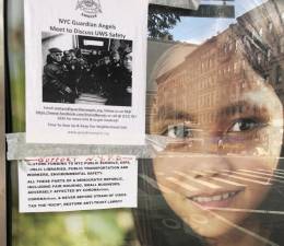 A flyer advertising a Facebook group focused on “neighborhood safety” on the UWS hangs in a bus shelter on Broadway. Photo by Mike Oreskes.