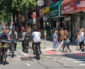 E-bikers freqently disregard traffic signs. One resident of Chinatown, Priscilla Loke was killed when she was hit by an e-biker, inspiring efforts to make all e-bikes subject to registration.