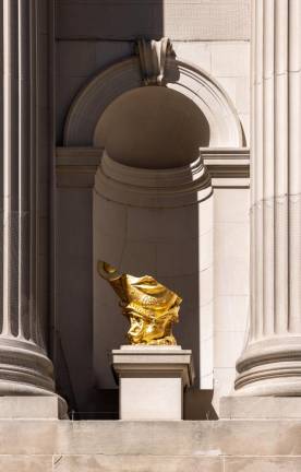Hew Locke, Installation view of Trophy 1, 2022 for The Facade Commission: Hew Locke, Gilt, 2022. Fiberglass, stainless steel, gilding, and oil-based paint Courtesy of Hew Locke; Hales Gallery, London; and PPOW, New York. Image credit: The Metropolitan Museum of Art, Photo by Anna-Marie Kellen