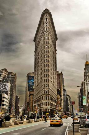 The Flatiron Building is once again up for auction after the highest bidder failed to pay up last month. <b>Photo: Flickr.</b>