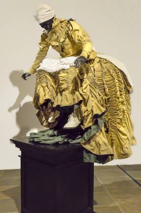 Mary Sibande's "Rubber Soul, Monument of Aspiration" from The Met Breuer's "Like Life." Sibande's work refers to the history of apartheid, said curator Sheena Wagstaff, but also to "the history of artists from that region ascending and taking over the plinth." Photo: Adel Gorgy