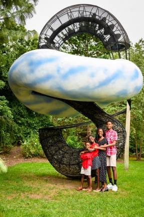 Grounds for Sculpture, a sprawling art park near Princeton and Trenton, contains more than 300 art pieces, many life-size or larger, bringing Seward Johnson’s visions to life. Here, a visiting family near Skyhook, a 1998 John Newman sculpture. Credit: Grounds For Sculpture, Gift of The Seward Johnson Atelier, ©Artist or Artist’s Estate, photo by David Michael Howarth Photography