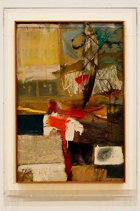 “Painting with Grey Wing” (1959) includes oil paint, printed reproductions, an unpainted paint-by-number board, typed print on paper, photographs, fabric, a stuffed bird wing, and some spare change. Photo: Adel Gorgy