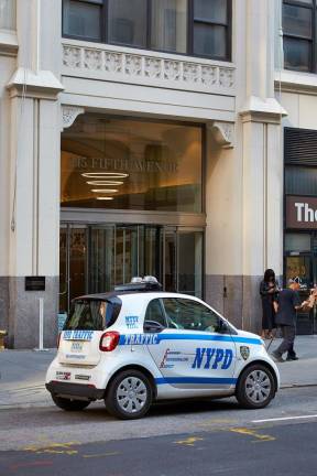An NYPD traffic car on Fifth Avenue. The police department claims that crime dipped by 4.1 percent overall last month compared to November 2022, although hate crimes surged by 33 percent.