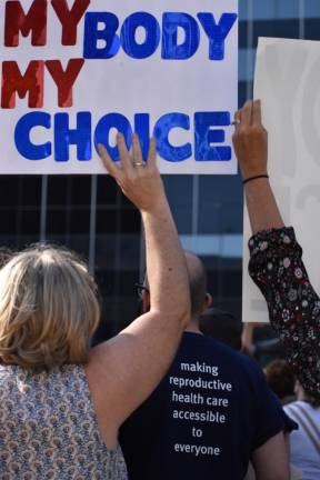 Saturday’s Women’s March in downtown drew crowds of all ages. Despite the ongoing coronavirus pandemic, many older men and women came out in protest of Texas’ anti-abortion legislation. Photo: Leah Foreman