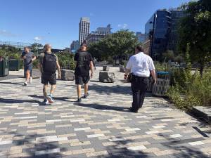 One NYPD officer patrols the the Gransevort Penninsula Athletic Field in Hudson River Park on foot around 10 a.m. on Aug. 25.