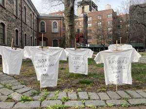 In St. Mark’s Church in-the-Bowery’s east yard on Palm Sunday, white T-shirts over 94 bamboo crosses bore the names of victims of gun violence in the last year. Photo courtesy of St. Mark’s Church-in-the-Bowery