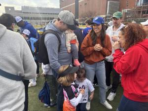 Carlina Rivera (blue cap), at the opening-day parade of the Peter Stuyvesant Little League this spring, has resigned her City Council seat to head up the NYS Association for Affordable Housing.