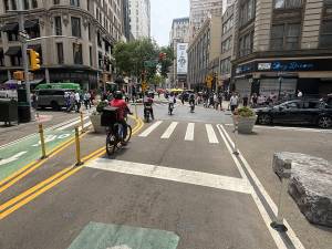 E-Bikes going through red light at Broadway and W. 25th St. in the Flat Iron district.