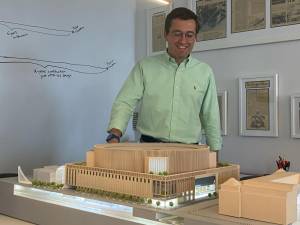 ASTM senior vice president Peter Cipriani,who is heading up the Penn Station proposal for North American subsidiary of the Italian developer, stands before a model of the proposed $6 billion redevelopment. Photo: Michael Oreskes
