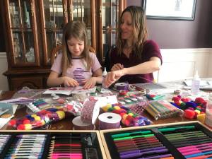 Nursing Home Card Project founder Rachel Bennett (right) and friend make cards.