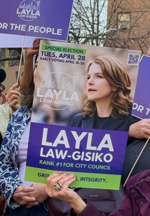 Layla Law-Gisiko (above center), who is running for City Council District 3, has survived a technical challenge to her ballot line that would have kicked her out of the race.