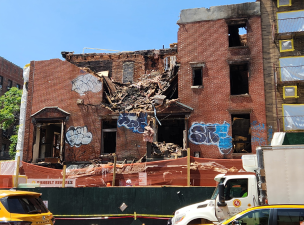 The Department of Buildings ordered this Chelsea building to be demolished and then issued two fines to the contractor assigned to the job on May 20 after a partial collapse of one of the floors.