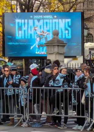 Fans on Broadway outside City Hall at the Gotham FC football parade.
