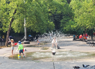 A view of the current “splash zone” and built-in stream at River Run Playground, off West 82nd Street. The park was set to lose the river during a proposed overhaul, but community rage has forced the city to reverse course.