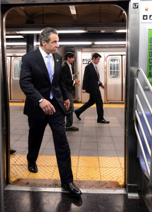 New York Governor Andrew M. Cuomo rode an E train from Chambers Street to Penn Station on September 25, 2014. Photo: Marc A. Hermann / MTA New York City Transit