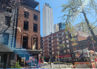 The once five -story building at 210 Seventh Ave. has been abandoned for about two decades. On April 12, it was gutted by a three-alarm blaze that took nearly 200 firefighters and EMS personnel two hours to bring under control.