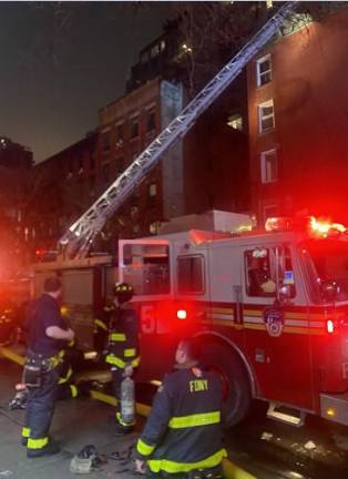 Firefighters from Engine 5 on E. 14th St. while a truck company stretched its ladder to the roof of the five story building to do a floor-by-floor search to make sure everyone was safely evacuated. There were no civilian casualties but two firefighters were injured.