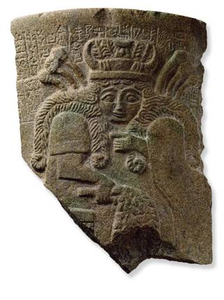 At the Morgan Library and Museum – Fragment of a vessel with frontal image of goddess Mesopotamia, Sumerian Early Dynastic IIIb period, ca. 2400 BC Cuneiform inscription in Sumerian Basalt. © Staatliche Museen zu Berlin-Vorderasiatisches Museum. Photo: Olaf M. Teßmer